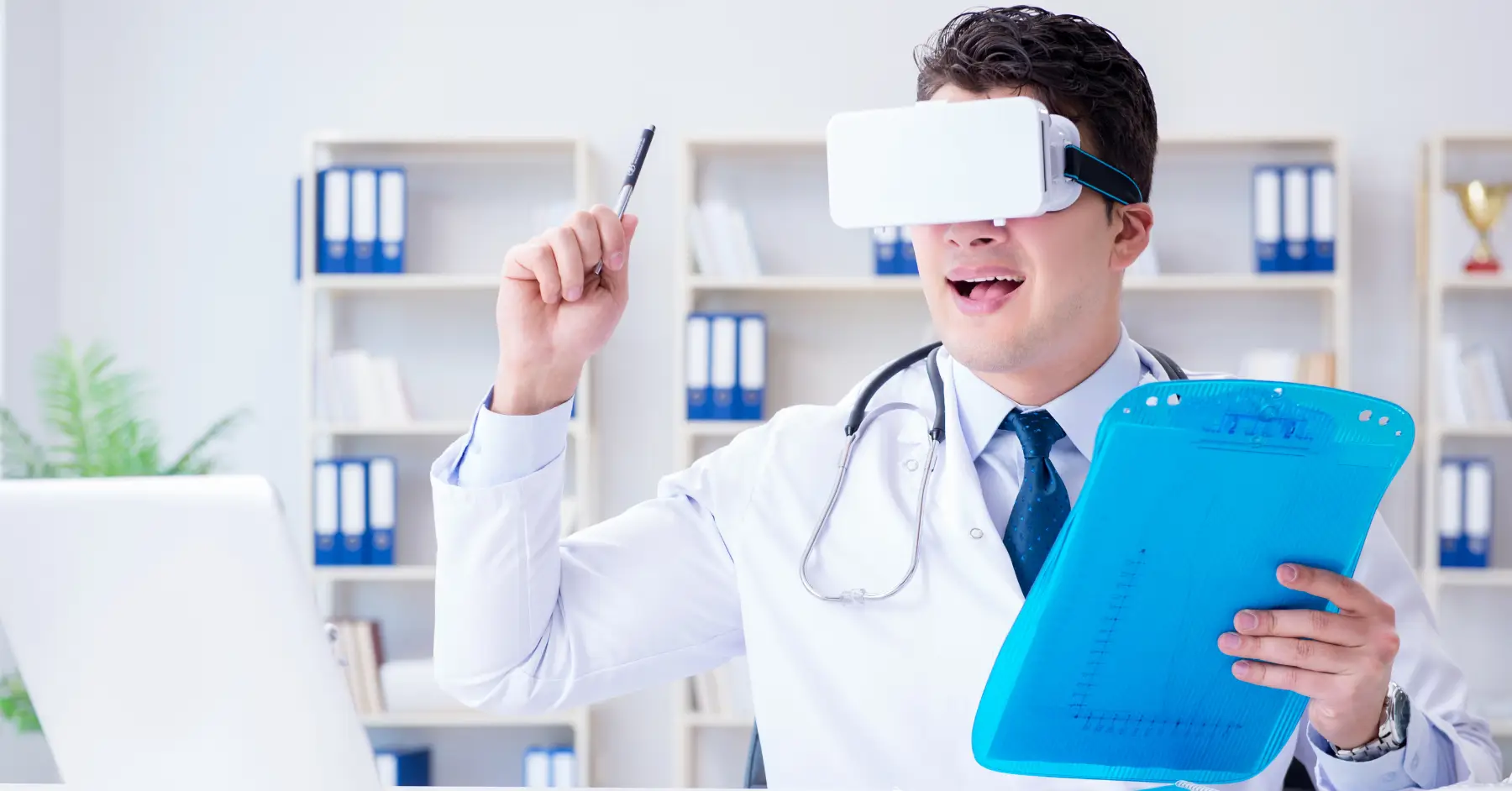Doctor using virtual reality headset to interact with digital healthcare applications.