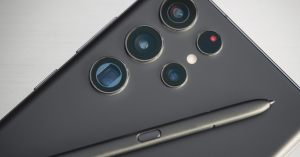 Close-up of a modern smartphone's rear camera setup and stylus.